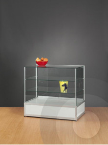 Glass display counter with glass on glass edges